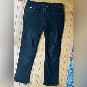 Lightly worn charcoal colored Kuhl jeans